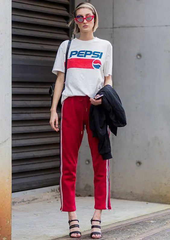 a girl with red Track Pants